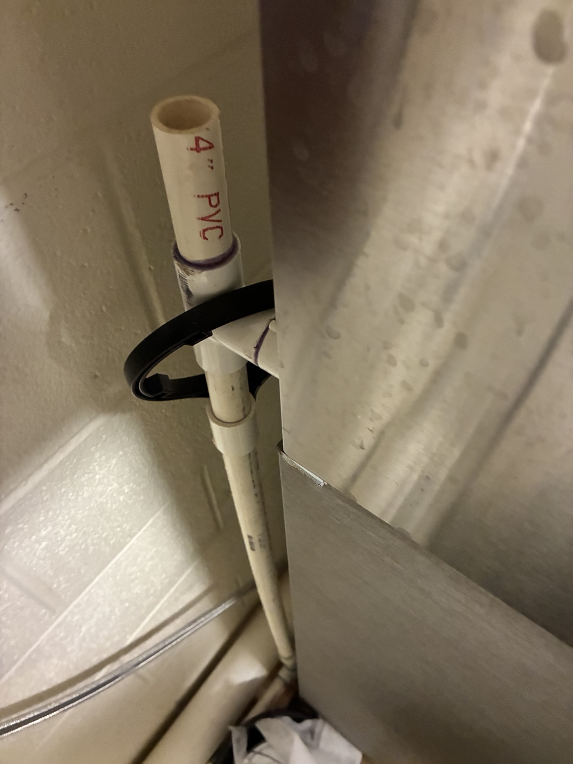 Ice maker drain piping and open standpipe