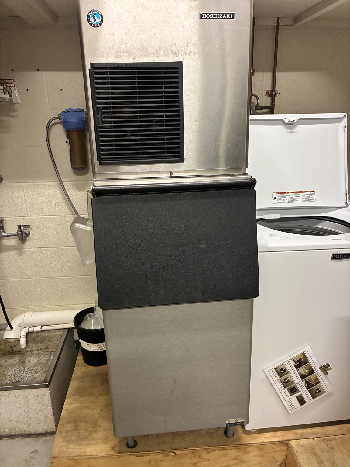 Hoshizaki F-450MAJ-C commercial flaker ice maker on storage bin