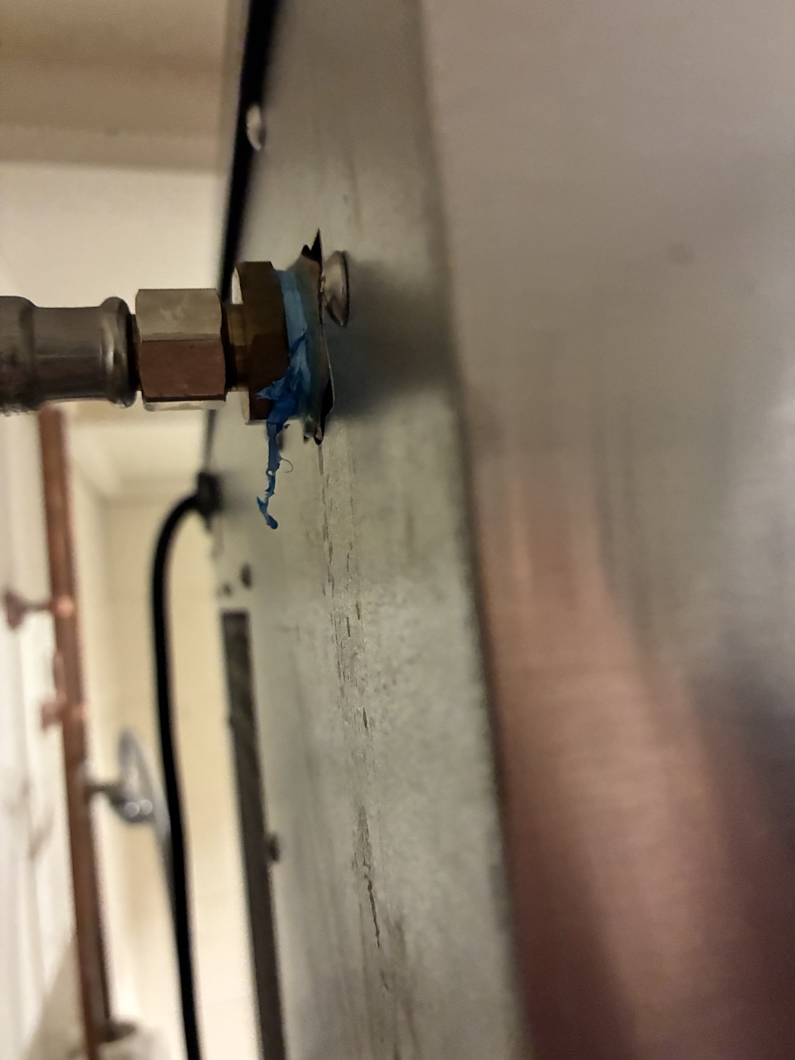Water connection entering Hoshizaki ice maker cabinet